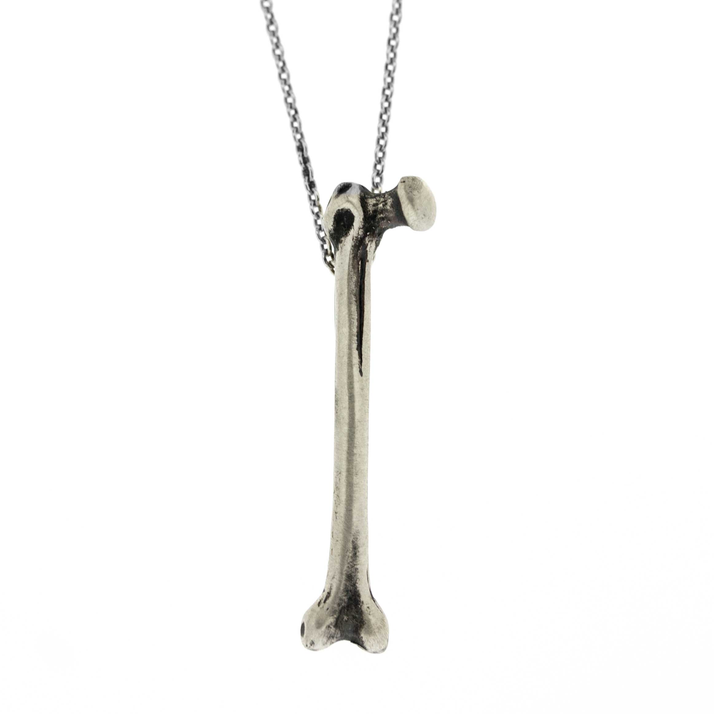 Tooth and Claw Human Femur Pendant